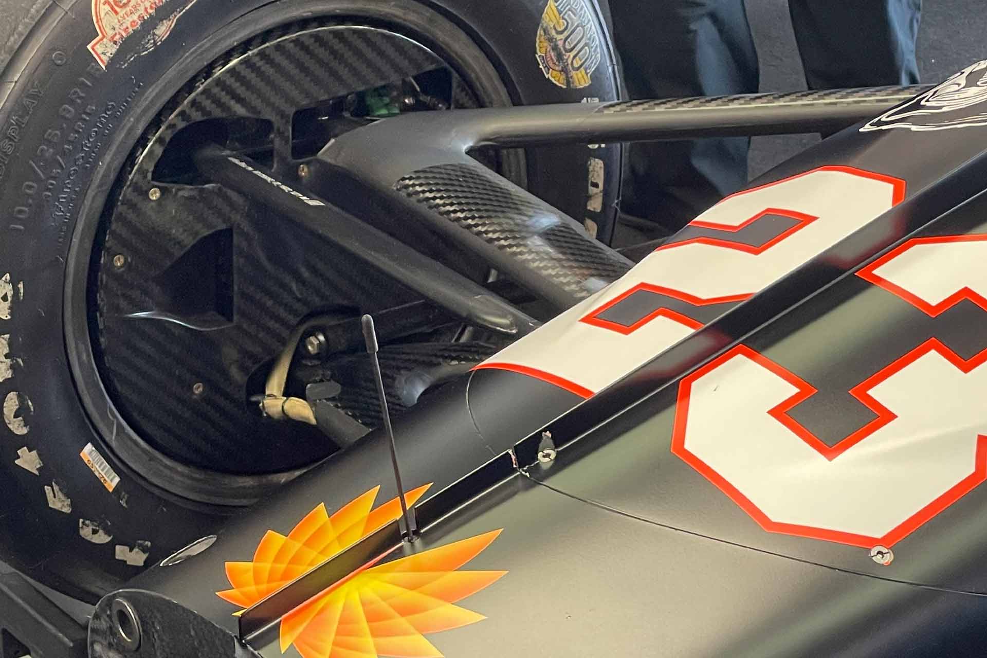 The Highs and Lows of Indy For Dreyer & Reinbold - A picture of a racing car with a tire on it, showcasing the thrill and challenges of motorsports.